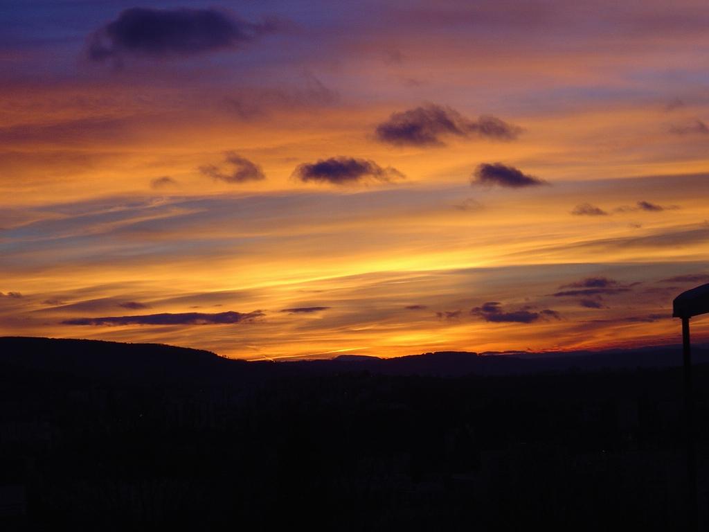 Wallpapers Nature Skies - Clouds Coucher de soleil sur la ville