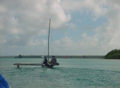 Fonds d'cran Bateaux Pirogues en baie d'Upi