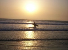 Wallpapers Nature coucher de soleil sur un surfeur