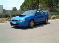 Wallpapers Cars subaru impreza bleu pare choc avant