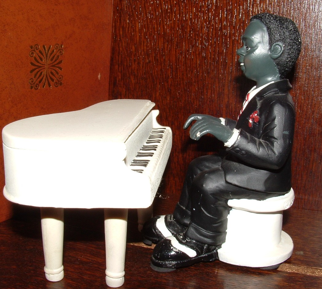 Fonds d'cran Objets Statuettes - Sculptures le pianiste