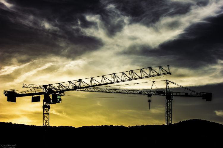 Fonds d'cran Constructions et architecture Chantiers Grues au coucher de soleil.